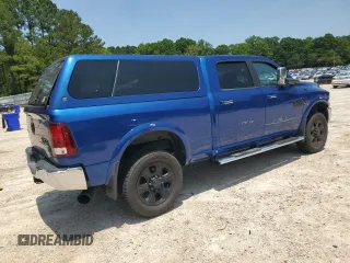 2015 Ram 2500 Laramie with VIN 3C6UR5FL5FG582579, listed as a Copart auction lot 58382715 with 128,605 mi miles and Salvage title. Bid and sale history available at DreamBid. Image 3.