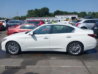 2019 Infiniti Q50 Luxe z VIN JN1EV7AP6KM518902, wystawiony jako IAAI lot #40292944 z przebiegiem 73 683 mil mil oraz . Historia ofert i sprzedaży dostępna na DreamBid. Obrazek 14.