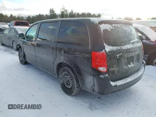 2012 Dodge Grand Caravan SE with VIN 2C4RDGBG7CR139874, listed as a IAAI auction lot 41377432 with 136,870 mi miles and . Bid and sale history available at DreamBid. Image 3.