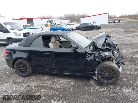 2011 BMW 1 Series 128i with VIN WBAUN1C5XBVH82457, listed as a IAAI auction lot 41173785 with Not provided miles and . Bid and sale history available at DreamBid. Image 13.