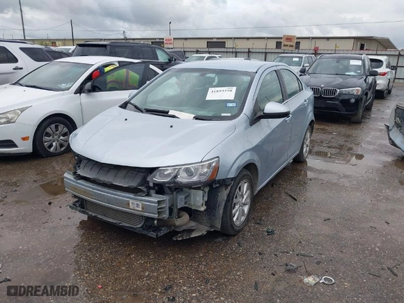 2017 Chevrolet Sonic LT with VIN 1G1JD5SBXH4164616, listed as a IAAI auction lot 41893250 with 52,033 mi miles. Bid and sale history available at carsss.com. Image 2.