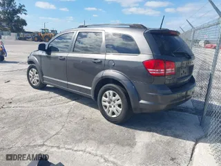 2019 Dodge Journey SE Value Pkg with VIN 3C4PDCAB7KT747315, listed as a IAAI auction lot 41028740 with 143,469 mi miles. Bid and sale history available at carsss.com. Image 3.