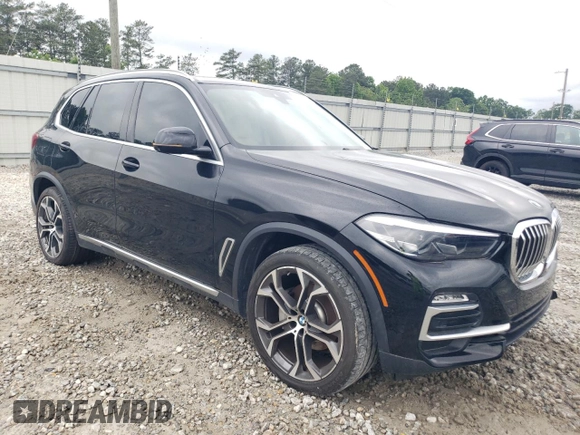 2020 BMW X5 sDrive40i with VIN 5UXCR4C0XLLW63728, listed as a Copart auction lot 56112475 with 65,704 mi miles and Clean title. Bid and sale history available at DreamBid. Image 4.