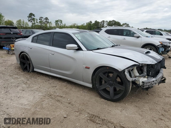 2019 Dodge Charger Scat Pack with VIN 2C3CDXGJ0KH688805, listed as a Copart auction lot 50822835 with 71,827 mi miles and Salvage Title. Bid and sale history available at DreamBid. Image 4.