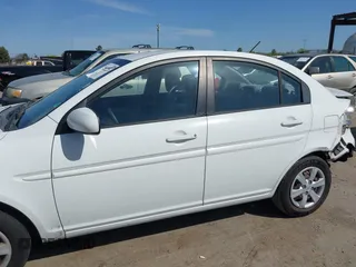 2010 Hyundai Accent GLS with VIN KMHCN4AC7AU473527, listed as a IAAI auction lot 41965592 with 104,506 mi miles. Bid and sale history available at carsss.com. Image 14.