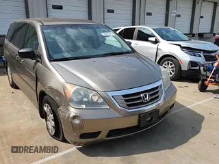 2008 Honda Odyssey LX z VIN 5FNRL38218B052952, wystawiony jako Copart lot #60907585 z przebiegiem 82 876 mil mil oraz Szkoda całkowita • Salvage title. Historia ofert i sprzedaży dostępna na DreamBid. Obrazek 14.
