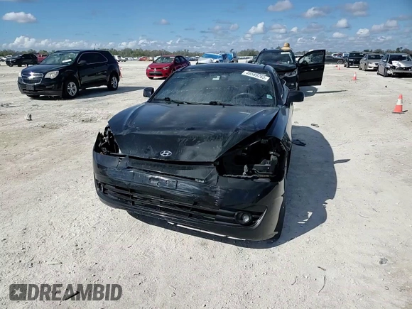 2008 Hyundai Tiburon GS z VIN KMHHM66D08U291605, wystawiony jako Copart lot #46589265 z przebiegiem 177 104 mil mil oraz Szkoda całkowita • Salvage title. Historia ofert i sprzedaży dostępna na DreamBid. Obrazek 10.