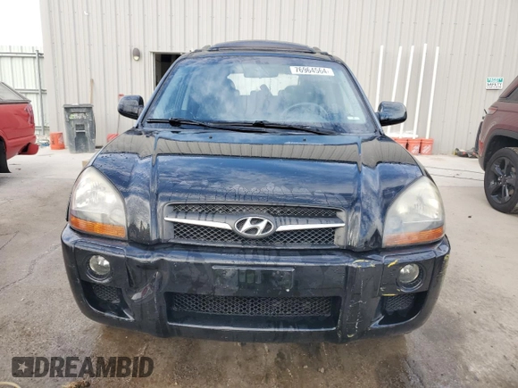 2009 Hyundai Tucson SE with VIN KM8JN72D69U974579, listed as a Copart auction lot 76964564 with 98,569 mi miles and Non Repairable. Bid and sale history available at carsss.com. Image 5.