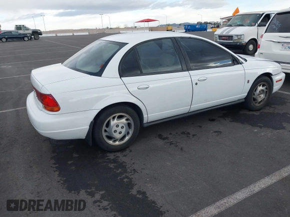 1997 Saturn SL with VIN 1G8ZK5275VZ254745, listed as a IAAI auction lot 41686816 with 135,074 mi miles and . Bid and sale history available at DreamBid. Image 4.