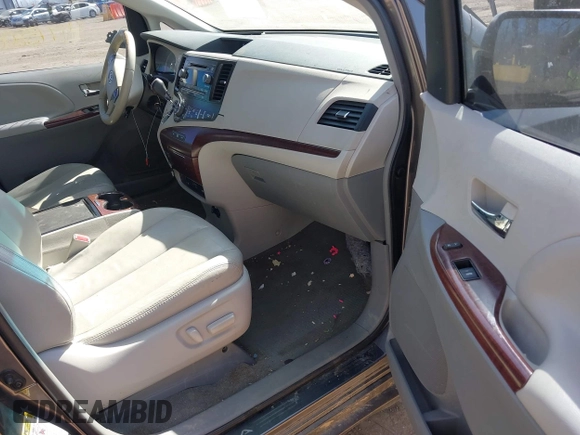 2012 Toyota Sienna XLE AAS with VIN 5TDYK3DC9CS227319, listed as a IAAI auction lot 41773806 with 178,803 mi miles and . Bid and sale history available at carsss.com. Image 5.