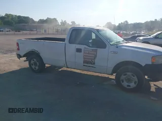 2006 Ford F-150 XL with VIN 1FTRF14W06NB28681, listed as a IAAI auction lot 42147085 with 381,160 mi miles. Bid and sale history available at carsss.com. Image 6.
