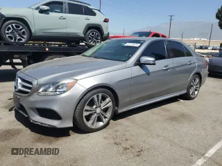 2014 Mercedes-Benz E 350 Sport with VIN WDDHF5KB5EA889494, listed as a Copart auction lot 61215475 with 109,879 mi miles and Salvage title. Bid and sale history available at DreamBid. Image 1.