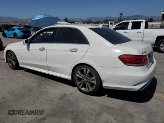 2014 Mercedes-Benz E 350 Sport with VIN WDDHF5KB0EA846889, listed as a Copart auction lot 56346475 with 110,930 mi miles and Salvage title. Bid and sale history available at DreamBid. Image 2.