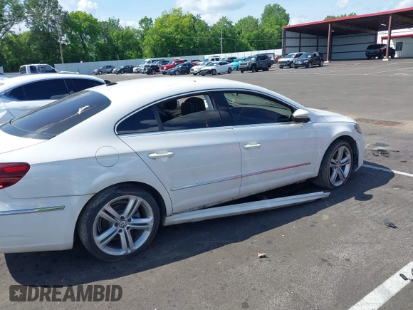 2014 Volkswagen CC R-Line with VIN WVWBP7AN7EE501064, listed as a IAAI auction lot 42220870 with Not provided miles and . Bid and sale history available at DreamBid. Image 6.