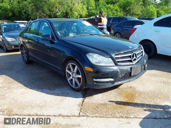2014 Mercedes-Benz C-Class C 250 Sport with VIN WDDGF4HB1EA958114, listed as a IAAI auction lot 42101249 with 85,100 mi miles. Bid and sale history available at carsss.com. Image 1.