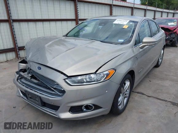 2015 Ford Fusion Energi Titanium with VIN 3FA6P0SU3FR114739, listed as a IAAI auction lot 42003011 with 120,553 mi miles. Bid and sale history available at carsss.com. Image 2.