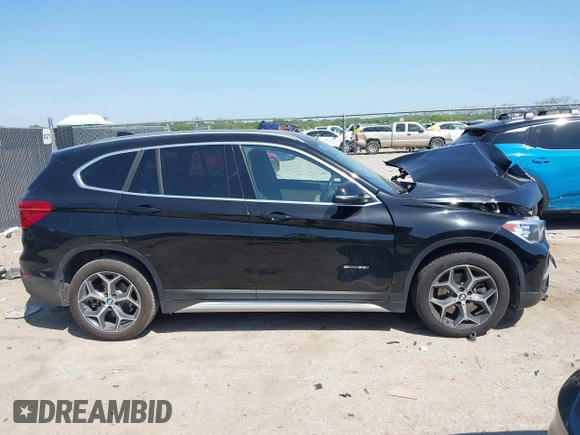 2017 BMW X1 sDrive28i z VIN WBXHU7C31H5H33748, wystawiony jako IAAI lot #42003198 z przebiegiem 71 274 mil mil oraz . Historia ofert i sprzedaży dostępna na DreamBid. Obrazek 13.