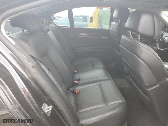 2012 BMW 7 Series 750i xDrive with VIN WBAKC6C52CC396443, listed as a Copart auction lot 44333945 with 134,075 mi miles and Salvage Title. Bid and sale history available at carsss.com. Image 10.