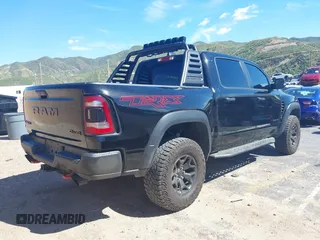 2022 Ram 1500 TRX with VIN 1C6SRFU95NN346475, listed as a IAAI auction lot 39200422 with 14,919 mi miles and . Bid and sale history available at DreamBid. Image 4.