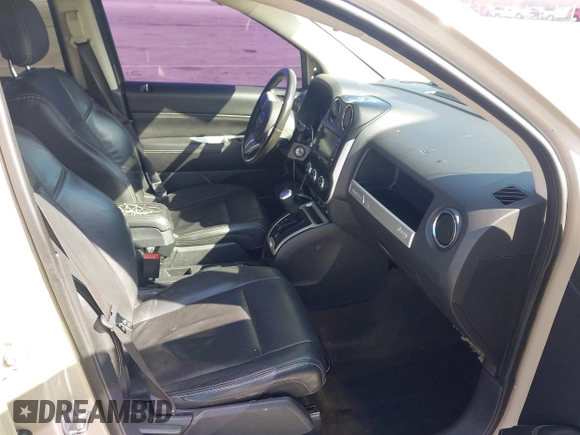 2017 Jeep Compass High Altitude with VIN 1C4NJCEB0HD200251, listed as a IAAI auction lot 41794163 with 141,419 mi miles and . Bid and sale history available at DreamBid. Image 5.