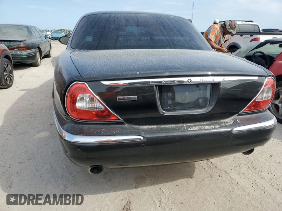 2006 Jaguar XJ with VIN SAJWA71BX6SH01193, listed as a Copart auction lot 76382034 with 0 mi miles and Salvage Title. Bid and sale history available at carsss.com. Image 6.