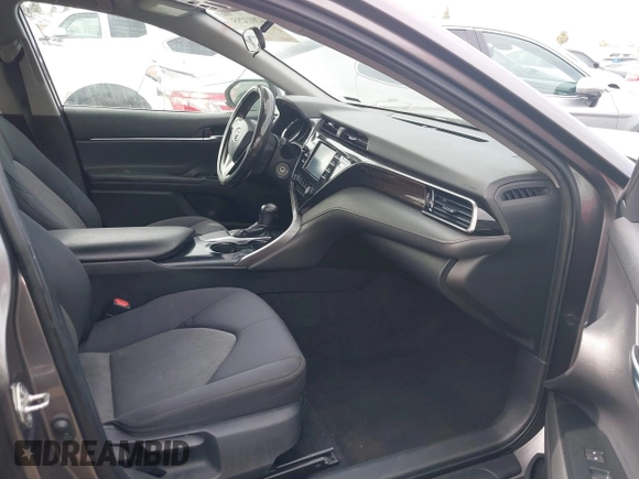 2019 Toyota Camry LE with VIN 4T1B11HK4KU254853, listed as a IAAI auction lot 42013255 with 153,664 mi miles and . Bid and sale history available at DreamBid. Image 5.