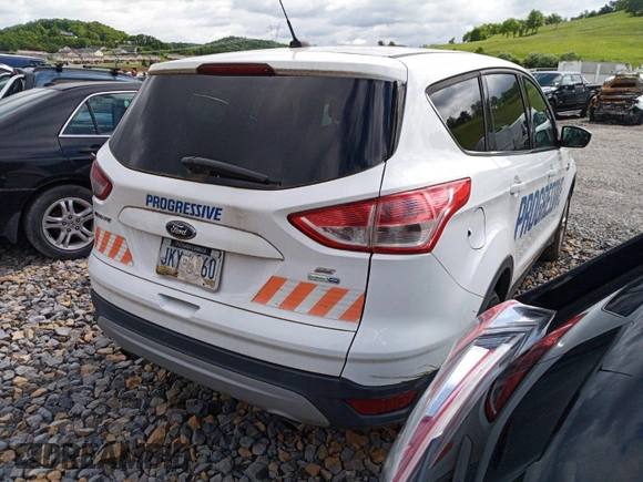 2014 Ford Escape SE z VIN 1FMCU9GX8EUC02895, wystawiony jako IAAI lot #42511705 z przebiegiem 104 900 mil mil oraz . Historia ofert i sprzedaży dostępna na DreamBid. Obrazek 10.