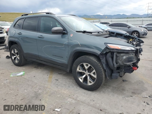 2015 Jeep Cherokee Trailhawk с VIN 1C4PJMBSXFW555223, выставлен на аукционе Copart как лот 62072235 с пробегом 207 240 миль миль и На запчасти • Non repairable. История ставок и продаж доступна на DreamBid. Изображение 4.