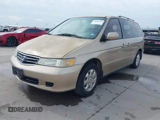 2002 Honda Odyssey EX-L z VIN 2HKRL18042H567858, wystawiony jako IAAI lot #41686147 z przebiegiem 264 570 mil mil oraz . Historia ofert i sprzedaży dostępna na DreamBid. Obrazek 17.