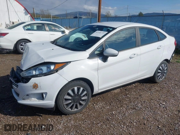 2018 Ford Fiesta S z VIN 3FADP4AJ2JM136775, wystawiony jako IAAI lot #42136725 z przebiegiem 47 072 mil mil oraz . Historia ofert i sprzedaży dostępna na DreamBid. Obrazek 2.