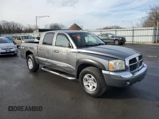 2005 Dodge Dakota Laramie with VIN 1D7HW58N25S204671, listed as a Copart auction lot 83838314 with 122,540 mi miles and Salvage Title. Bid and sale history available at DreamBid. Image 4.
