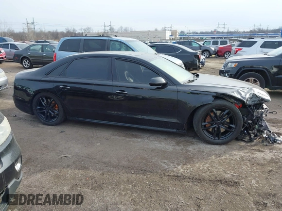 2016 Audi A8 L 4.0T Sport with VIN WAU43AFDXGN005323, listed as a IAAI auction lot 41311344 with 84,000 mi miles. Bid and sale history available at carsss.com. Image 13.