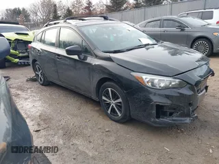 2019 Subaru Impreza Premium with VIN 4S3GTAC67K3718254, listed as a IAAI auction lot 41640141 with 63,005 mi miles. Bid and sale history available at carsss.com. Image 1.