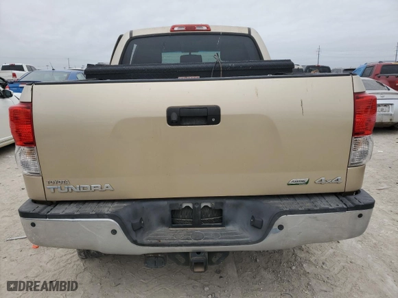 2010 Toyota Tundra 4WD Truck LTD with VIN 5TFHW5F14AX095802, listed as a Copart auction lot 42676385 with 0 mi miles and Salvage Title. Bid and sale history available at carsss.com. Image 6.