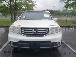 2013 Honda Pilot Touring with VIN 5FNYF4H96DB016044, listed as a IAAI auction lot 42314590 with 183,913 mi miles and . Bid and sale history available at DreamBid. Image 12.