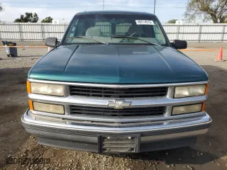 1999 Chevrolet Tahoe with VIN 1GNEC13R4XJ333150, listed as a Copart auction lot 48514915 with 195,543 mi miles and Clean Title. Bid and sale history available at carsss.com. Image 5.