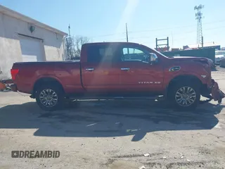 2016 Nissan Titan SL z VIN 1N6BA1F44GN503563, wystawiony jako IAAI lot #41977780 z przebiegiem 126 050 mil mil oraz . Historia ofert i sprzedaży dostępna na DreamBid. Obrazek 14.