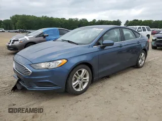 2018 Ford Fusion SE z VIN 3FA6P0HD1JR186295, wystawiony jako Copart lot #57379995 z przebiegiem 113 308 mil mil oraz Szkoda całkowita • Salvage title. Historia ofert i sprzedaży dostępna na DreamBid. Obrazek 1.