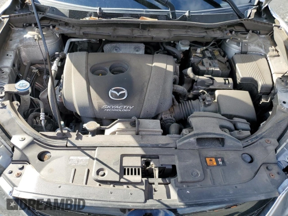 2014 Mazda CX-5 Touring with VIN JM3KE4CY4E0427294, listed as a Copart auction lot 51372155 with 121,324 mi miles and Salvage Title. Bid and sale history available at carsss.com. Image 14.