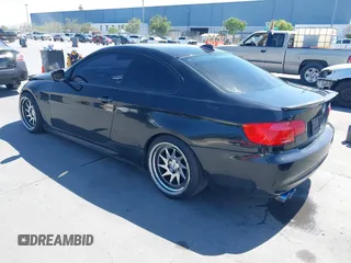 2011 BMW 3 Series 328i with VIN WBAKE3C51BE557814, listed as a IAAI auction lot 42196874 with 114,255 mi miles and . Bid and sale history available at carsss.com. Image 3.