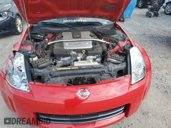 2007 Nissan 350Z Touring z VIN JN1BZ36A87M653584, wystawiony jako Copart lot #85269194 z przebiegiem 57 030 mil mil oraz Szkoda całkowita • Salvage title. Historia ofert i sprzedaży dostępna na DreamBid. Obrazek 11.