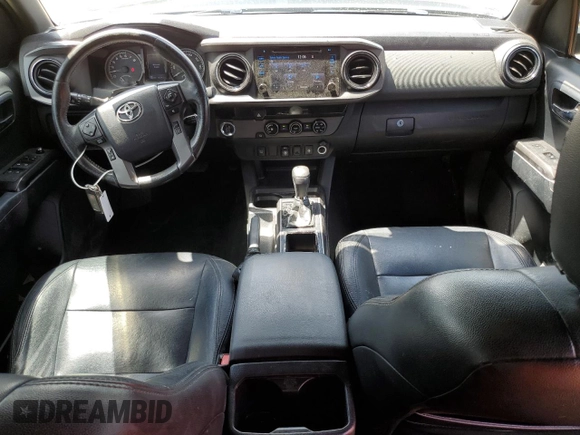 2018 Toyota Tacoma SR5 with VIN 3TMAZ5CN0JM058283, listed as a Copart auction lot 53863265 with 135,562 mi miles and Salvage Title. Bid and sale history available at DreamBid. Image 8.