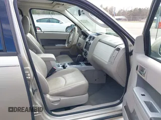 2010 Mercury Mariner Premier with VIN 4M2CN8HG4AKJ05736, listed as a IAAI auction lot 41744987 with 209,819 mi miles and . Bid and sale history available at DreamBid. Image 5.