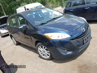 2015 Mazda 5 Sport with VIN JM1CW2BL7F0179452, listed as a IAAI auction lot 42739754 with 111,564 mi miles and . Bid and sale history available at DreamBid. Image 1.