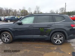2021 Volkswagen Atlas SE z VIN 1V2DP2CA8MC524593, wystawiony jako IAAI lot #42006866 z przebiegiem 60 419 mil mil oraz . Historia ofert i sprzedaży dostępna na DreamBid. Obrazek 14.