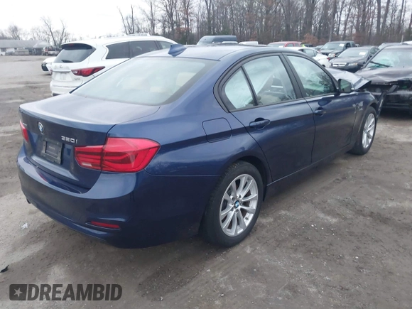2018 BMW 3 Series 320i xDrive with VIN WBA8E5G58JNV02954, listed as a IAAI auction lot 41140422 with Not Provided miles. Bid and sale history available at carsss.com. Image 4.