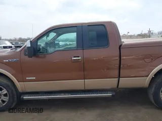 2011 Ford F-150 XL with VIN 1FTFX1ET9BKD67310, listed as a IAAI auction lot 42016119 with 147,114 mi miles. Bid and sale history available at carsss.com. Image 14.