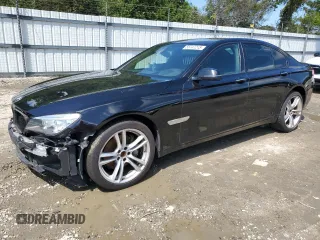 2015 BMW 7 Series 740i with VIN WBAYA6C59FD826788, listed as a Copart auction lot 55747215 with 134,960 mi miles and Salvage title. Bid and sale history available at DreamBid. Image 1.