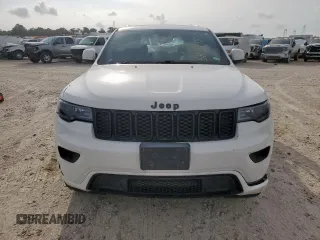 2018 Jeep Grand Cherokee Altitude with VIN 1C4RJEAG1JC397392, listed as a Copart auction lot 58214815 with 118,390 mi miles and Salvage title. Bid and sale history available at DreamBid. Image 5.