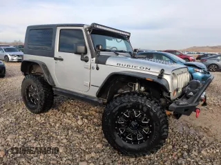 2007 Jeep Wrangler Rubicon z VIN 1J8GA64157L125319, wystawiony jako Copart lot #82929184 z przebiegiem 82 019 mil mil oraz Szkoda całkowita • Salvage title. Historia ofert i sprzedaży dostępna na DreamBid. Obrazek 4.